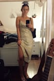Love the dress! Color is more yellow in person but still very cute. The thin straps are very flattering and it has a cute tie back feature that allows you to tighten/loosen straps. The dress is a little long and hits about mid calf. Also cute if paired with a waist belt to make the dress a little shorter. - Kristy S.