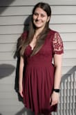 I originally bought a size large and it was too big. I returned it for a size medium and it fit like a glove! Such a flattering style, and I felt incredibly comfortable in the dress! - Krista K.