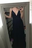 I ordered five dresses for prom, and I can proudly say I'll be wearing this one! It was so soft and not too long with heels. It also showed just the right amount of cleavege, and I can wear it without a bra. Also when bending down there's no chance of my boobs falling out! They did send it to me an XS when I ordered it in a S, but it worked in my favor because it fit great! - Umran B.