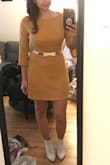 Bought this in mustard and plum colors cause they were on sale. Great little dresses. They were a tiny bit on the short side in the back, but I'm normally a medium and medium fit great. - Carmen A.