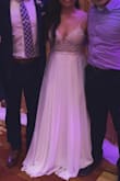 Wore this dress as a second dress at my wedding. Received many compliments on it! It was easy to dance in, and I wore flats with this dress. The beading is absolutely beautiful. When purchasing it, I was worried it may be too see-through but it was fine! So happy I bought this dress!! - Diana G.