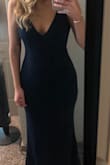 The fit was flattering, especially for curves. The only complaint was it was a little big in the chest and wasn't supportive. It's also hard to wear a bra with. - Devon W.