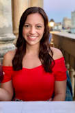 Very comfortable material! The red is vibrant in a great way! I've worn with jeans and I've worn with a skirt! Can be work more like a t-shirt or off the shoulder. - Samantha M.