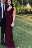 Covers everything you want it to and flatters the booty and the bust! I am usually between a medium and small - I ordered one of each and ultimately went with the small. Would order this dress again in a different color for another occasion! - KAYLA B.