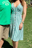 This dress is great for summer! Fits a little big but wouldn't change the size since it sort of shrunk after I washed it. I wore it w/ sandals and then white converse. - Rosalia S.