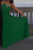 This dress is gorgeous from the way it fits and flows to its stunning green color. There is so much fabric on the lower half, but it wasn't heavy at all. It's very flowy and breathable. I did have to have it hemmed because I'm short and it was pretty pricey because of the amount (and type? I think) of material they had to hem off. I definitely don't regret it though because I absolutely love this dress. Your waist measurement is very important in picking a size because the waist area on this dress has absolutely no stretch, otherwise, I think it is pretty flawless. This is my very first purchase from Lulus, and the reason I kept coming back. - Ariane J.
