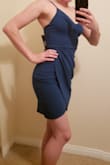 This dress is true to size. I am in between an XS and a S with Lulus and the size S was perfect for this dress. The color is more blue than what is shown in the picture, but it is still gorgeous. This dress does not have a zipper, you just slip it over your head. I absolutely love it and it looks great with some major statement earrings! - Marissa V.