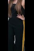 Bought this on a whim and I am so glad I did! This jumpsuit can be dressed up or down. It's comfortable to wear and most importantly SUPER flattering. The top is quite unique and the yellow stripe gives it the edge. Thanks once again Lulus! - Katy P.