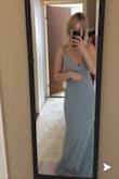The dress looked stunning even though I expected the color to be a little greener. I'm going to wear it to prom, and I'm sooo excited to show it off! The shipping went smooth and fast directly to my door. It's just overall stunning. SO STUNNING. - Emilia L.