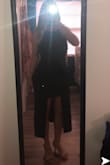 Bought to wear as a wedding guest. Fits great and very comfortable. Shows a little leg but not too sexy with longer over lay in back. - Aimee G.