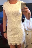 I bought this dress for my bridal shower and I love the open back! It's a little bit big but I won't be returning it. - Savannah N.