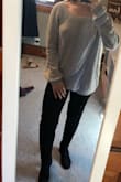 I love this sweater. I have it in two colors! I always get compliments on it! Love the open back! I got extra smalls, and they are a little to big for me because the sleeves fall off my shoulder. Other than that, I love them! - Alivia C.