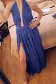 It runs long on me so I recommend that if you're around my height to definitely wear heels, adjustable so you have the option of the slit in the side or not. Overall, perfect fit. - Alexandra