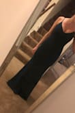 This dress is a gorgeous color and is stretchy and comfortable. - Raquel G.