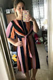 I absolutely love this dress. It's very classy but also has a trendy, retro vibe to it. It fits perfectly and is so adorable. Would definitely recommend! - Samantha P.
