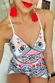 I got these earrings to match with the Rhythm Is Gonna Get You two piece outfit, and they match perfectly. They don't weigh down your ears at all. They add a nice pop of color to a plain outfit. - Joanna F.