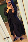Love love this black trench jacket it fits perfect on me, and the length is what I wanted since I am on the shorter side I like the long length on me. It pairs well with the gray ribbed midi I also purchased on Lulus! Can't go wrong with a black trench jacket which will pair with absolutely everything! You can totally dress it up or down. I have already received so many compliments. - Raksmey R.