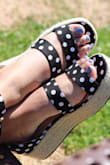 These espadrilles are a must have. I was so torn between the colors available but opted for the bold Black & White Polka dot print. I could not be happier!! These shoes will bring a definite pop to ANY spring and summer outfit. The platform heels make for an easy, comfortable wear while maintaining a chic look. My personal favorite features are the fun print being on the sole and the elastic band near the foot arch makes for a forgiving walk. If you are reading this, buy the shoe before it's too late! ;) - Stacia V.
