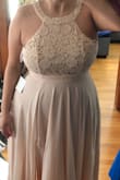 I love the top lace. However, it is not a perfect fit for me. The zipper would not close. The color is more peachy than blush pink. - Alexis H.