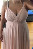 It is a little tight on the top, but with the right bra I'll be able to wear it. If you are big chested, you might have to pin it up to avoid showing too much cleavage. The color is truly blush pink. - Alexis H.