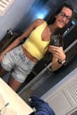 This crop is SO CUTE and makes whatever tan you have pop. The material is fantastic and is thick and good quality. My bust are big so probably should've sized up to a medium so that the front of the crop top wouldn't be shorter than the back. Could probably go braless but just a little too low cut for it. I tried with both a strapless and a regular bra with crossing the straps and both worked as long as you don't mind seeing the straps through the material. Going to wear it onto my cruise next week for boarding the ship! - Erica S.