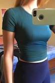 This is a great top. The teal blue is gorgeous and it fits just right. The material is stretchy and comfy too! Just be careful to wear the right bra: no patterns. I'm thinking about ordering in more colors! - Elise G.