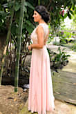 I buy this dress for my cousins wedding and I just loved it. Love the color and love the upper side. - Georgina I.