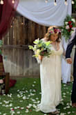 This dress was stunning. I'm so very happy I bought this dress. I wore it for my wedding but because of the cold weather and our wedding taking place outside I bought a lace cover up that complemented it perfectly. I am short so I did have to hem it but all other areas it was as if it was made for me. I am not a 38DDD but rather a 38F. But it for like a glove. - Denise S.