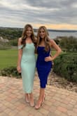 This dress is perfect! Great material, thick enough to cover lumps and bumps, didn't even need spanks! Got lots of compliments!! I want one in every color! - Megan T.