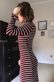 I love this dress, I ordered a medium so I didn't feel like I could only wear it on my "skinny days" y'all know what I mean. And it looks good at all times. Doesn't look baggy, doesn't look too tight. It's perfect. - Anna F.