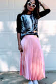 I am total obsessed with this skirt, i love the silky feel of the material and the length is perfect. It fits well and the color is a great transition for the spring. I paired it with a black shirt and sneakers and what i love about it is that it goes well with any thing. So dress it up or down it a most have item in your closet. - Donia M.
