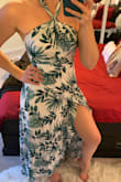 Nice flowy material with a short liner to prevent it from being see-through. I love that it's a wrap as well, so you can custom fit it to your size/ shape. The only thing I'm not 100% sold on is the print. It definitely looks like the perfect beach vacation dress, but it might be too much tropical print for any other occasion. - Lara S.