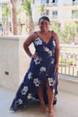 LOVED THIS DRESS! I wore it to a wedding and got so many compliments. It's the perfect blend of casual and elegant. The dress was so comfortable I didn't want to take it off at the end of the event.The wrap effect in the front coupled with the train in the back gave such a nice flow when walking and looked great in pictures. I paired with nude heels and a clutch to finish it off. Great for wedding guest or even homecoming. - Victoria H.