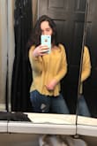 It was more over sized than I initially thought when ordering, as I have a smaller upper half and usually struggle with oversized pieces, but it worked out perfectly. The yellow is super mellow and will look amazing once it's warmer and with a tan. Perfect for all seasons. Highly recommend. - Sydney S.