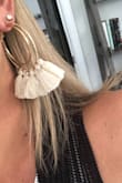 Love them. Looks just like the photo. The tassel actually moves and they're just a super fun earring. Good quality and not heavy. - Renee B.