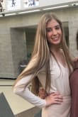 I have worn this under skirts and jeans on many occasions and I always get a ton of compliments! I love it because I can dress it up or down depending on the look I am going for. I sometimes pin the top together if I want to look more professional! - Alana C.