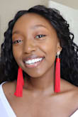 The color is gorgeous! The tassels are great quality and definitely makes a for a bold statement piece. I wore these earrings out with a cocktail dress, but they can also brighten up a casual outfit. - Sunny S.