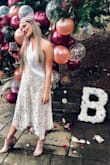 Love this dress! I did have it taken in a bit at the stomach but this was PERFECT for my shower! - Brittany P.
