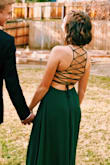 The dress fit me so well and was so comfortable! The length was perfect with heels and the strappy back was really fun and unique. I loved the look of the dress and the secure-ness of it as well. :) - Haley M.