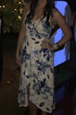 I wore this dress on multiple tropical vacations and I got so many compliments on it! It is a unique wrap dress that ties on the side. The material is light and cool, and the pattern is so cute! Perfect for any vacation or event! - Elle H.