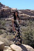 The dress is very pretty! You can easily dress up or down with it. I would still highly recommend buying this dress. However, I have to say that this dress always come out extremely wrinkly after a wash. - Janet K.
