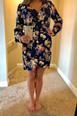 This dress managed to exceed my expectations! The material felt expensive and the blue color and florals were as rich as the photo. I thought I was going to need a large due to my bust size (39) and what was recommended based on the sizing chart. I was pleasantly surprised that the medium fit perfect, if not a little big (nothing than some fashion tape couldn't fix). Wrap dresses usually don't fit bigger chested girls as they're plunging and wrap awkwardly around the waistline, but this dress has a built in cinch that avoids the awkwardness of the wrap string. The long sleeves help hide arm fat, and the length is short enough to still be sexy. If you're a taller person, it may fall shorter on you as it was just right for my height. Can't recommend enough!! - Joanna S.