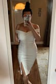Love the material. Stretchy but thick and fitted. Very flattering. It's hard to find nice white dresses. This is one of them! - Toni A.