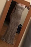 This dress is absolutely stunning. It fit like a glove and hugged in all of the right places. I was worried the top wouldn't fit, as I'm not the most busty, but I found a strapless bra which helped with any slipping. This dress made me feel like a princess and the price is also a dream. - Danielle W.