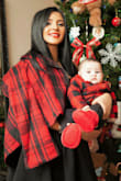 This fits perfect and falls nicely as a statement piece over a dress or jumper. Material is soft inside and it feels super comfy which is a plus. Has a formal and classy look. Looks exactly as pictured on website. I wore it for a Christmas function..a couple of months after delivering my baby and loved it! - Shivana N.