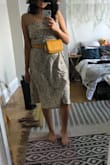 I got this on sale and it is worth every penny. I was worried about the fit since other reviews had said the zipper sticks out or it's stitched strangely, but I got a large and it fit me perfectly! I can't wait to wear it out. - Neha D.