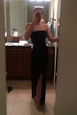 I ordered it in XS, and it fits so well! It hangs right to the floor in heels, and the material is very nice. The waist is fitted and the sash/ bow adds a measure of adjustability. There is a grippy strip at the top that keeps it in place. It is super comfy too! - Ella B.