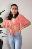 I bought for a festival and used it for a video online. The delivery was quick and the material is so nice and breezy. The fit is comfortable and I would definitely buy again!! - Valentina B.
