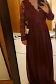 This ia a beautiful dress! I ordered a medium because I was concerned I would have too much cleavage with a small, but there was plenty of room and since it's backless a small would have held me in better. The length is long so it does need alterations, but it's worth it if you are looking for an elegant dress at an affordable price. Color is beautiful and the dress is high quality. - Heidi S.