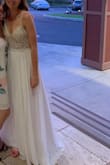 So nice, I bought it twice! This is THE wedding dress. I had so many strangers and friends come up to me and say it was the most beautiful dress they'd ever seen. And you can't beat the price!!

Length issues: The train makes it trickier to walk in. I had to wear 3 inch heels. - Lisa L.
